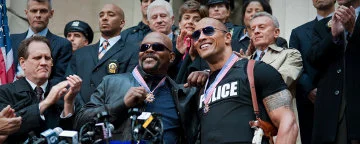 Detective Highsmith And Detective Danson Being Given Medals And Being Photgraphed