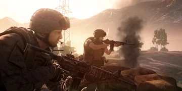 A pair of soldiers, firing from behind sandbags