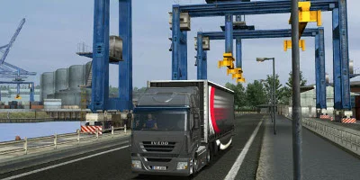 black and red truck crossing bridge