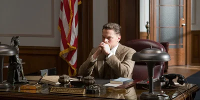 Still of Leonardo DiCaprio Sat at Desk