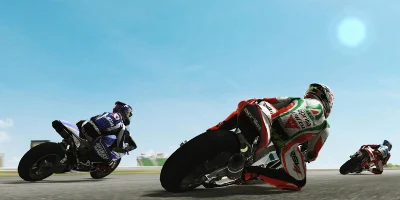 Three riders going round a corner together