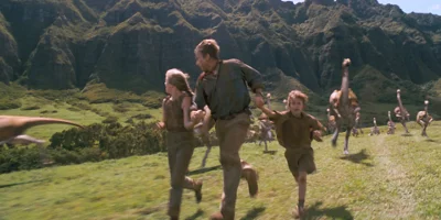 Man and Children Running From Dinosaurs