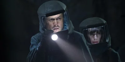 Man Holding Torch in Suit