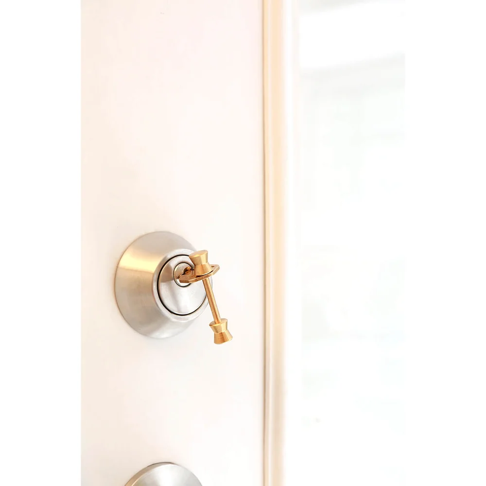 Kikkerland Long Cone Brass Key Holder Image 1